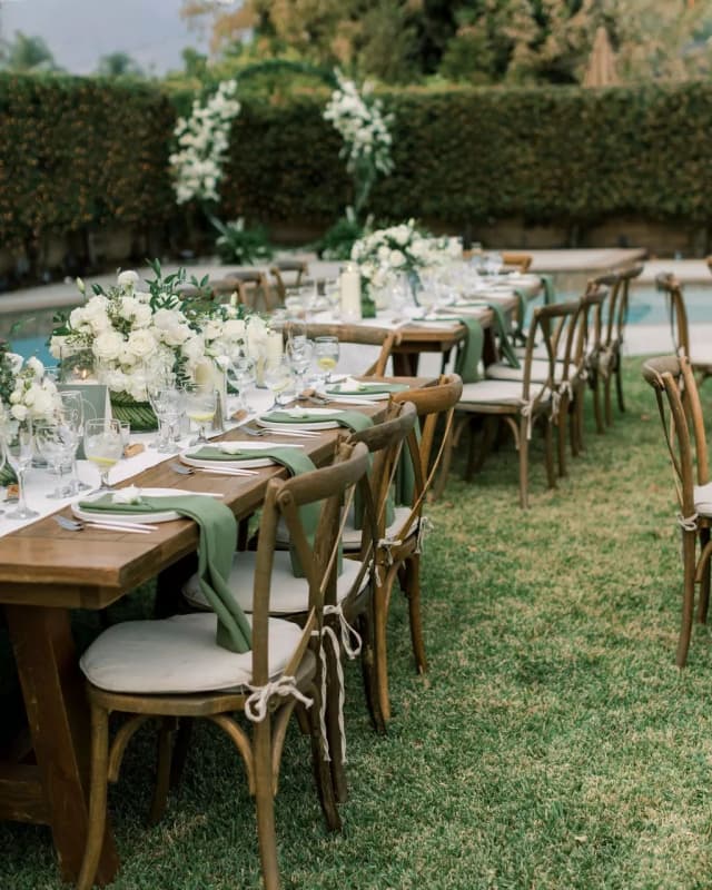 Outdoor wedding layout with cross back chairs Outdoor wedding layout with cross back chairs